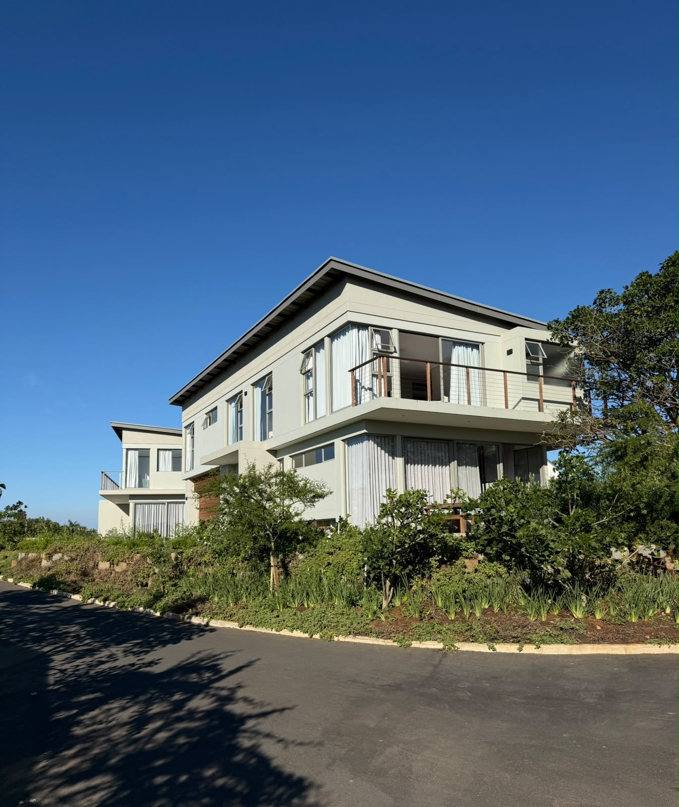 Landscaped gardens and freestanding homes